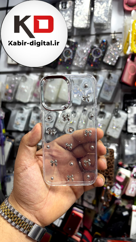 قاب گوشی iPhone 16 آیفون طرح اکلیلی رزینی پشت طلق شفاف لاکچری پاپیونی