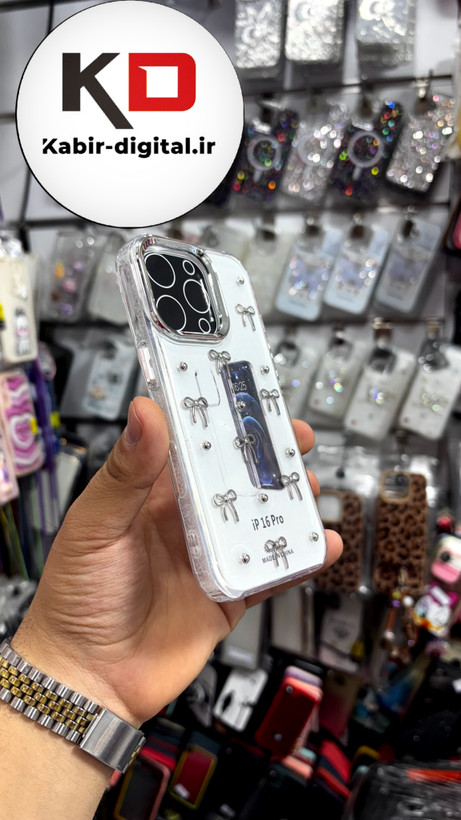 قاب گوشی iPhone 16proآیفون طرح اکلیلی رزینی پشت طلق شفاف لاکچری پاپیونی کرومی
