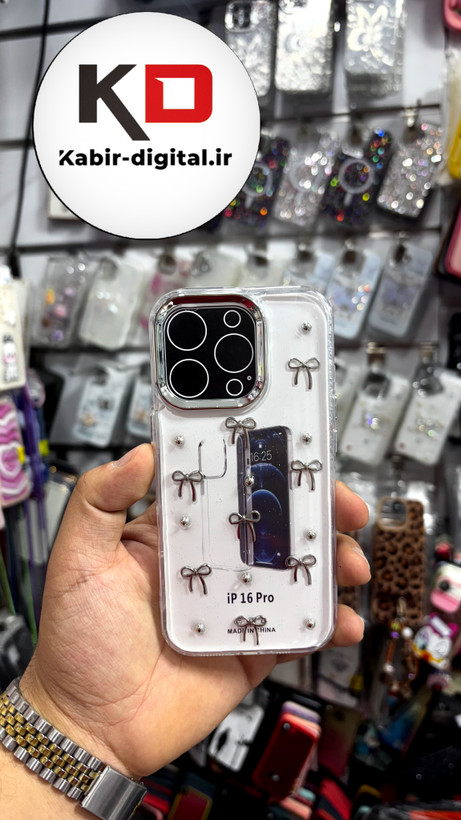 قاب گوشی iPhone 16proآیفون طرح اکلیلی رزینی پشت طلق شفاف لاکچری پاپیونی کرومی