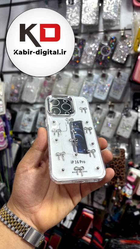 قاب گوشی iPhone 16proآیفون طرح اکلیلی رزینی پشت طلق شفاف لاکچری پاپیونی کرومی