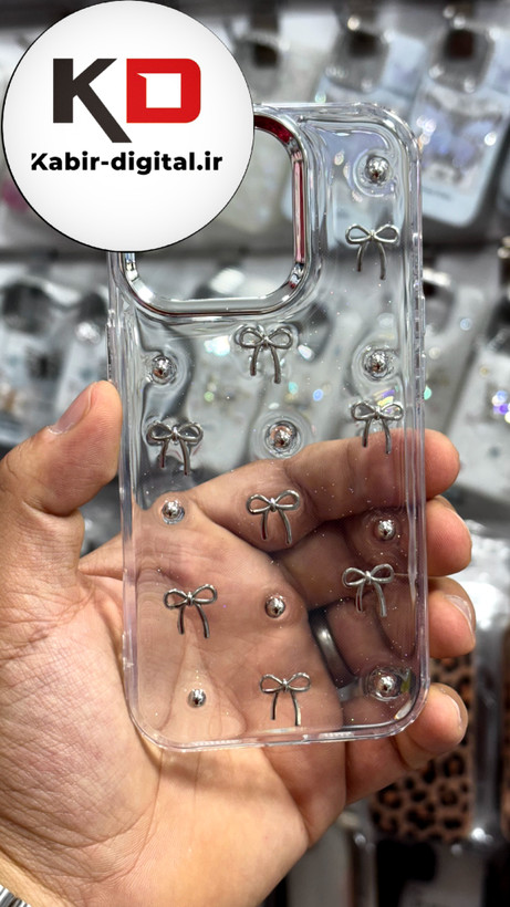 قاب گوشی iPhone 16proآیفون طرح اکلیلی رزینی پشت طلق شفاف لاکچری پاپیونی کرومی