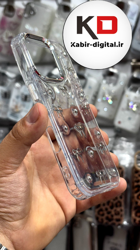 قاب گوشی iPhone 16proآیفون طرح اکلیلی رزینی پشت طلق شفاف لاکچری پاپیونی کرومی