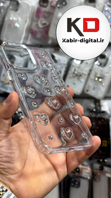 قاب گوش iPhone13Promaxآیفون لاکچری شفاف رزینی طرح شاین لنز کرومی طرح قلب