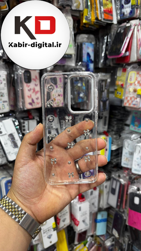 قاب گوشی Galaxy A36/A56 سامسونگ طرح اکلیلی رزینی پشت طلق شفاف لاکچری پاپیونی دور محافظ متال