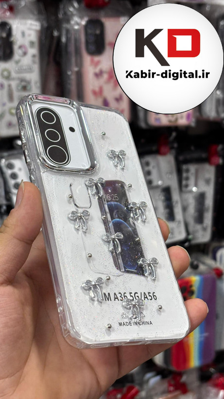 قاب گوشی Galaxy A36/A56 سامسونگ طرح اکلیلی رزینی پشت طلق شفاف لاکچری پاپیونی کرومی دور محافظ متال