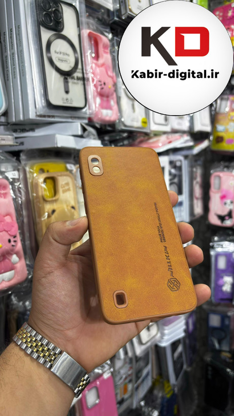 قاب گوشی Galaxy A10 سامسونگ نیلکین NILLKIN سوزنی چرمی محافظ لنز دار عسلی