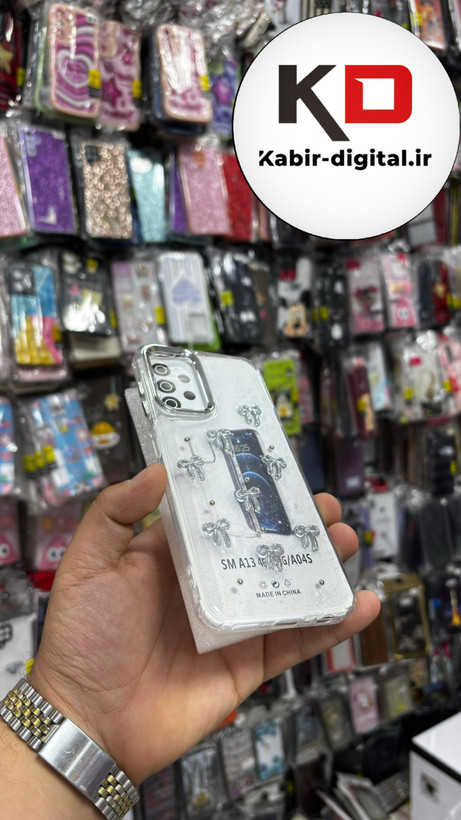 قاب گوشی Galaxy A04s سامسونگ طرح اکلیلی رزینی پشت طلق شفاف لاکچری پاپیونی کرومی دور محافظ متال