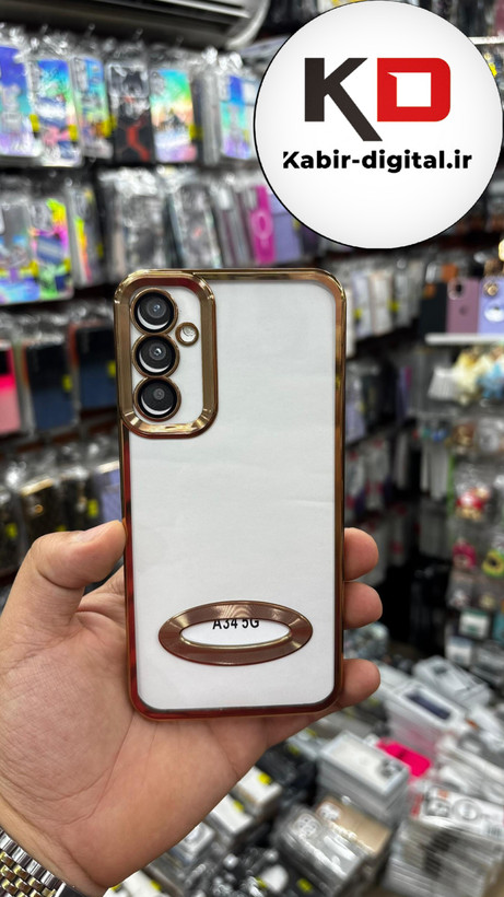 قاب گوشی Galaxy A34 سامسونگ طرح الکتروپلیتینگ ژله ای شفاف اورجینال طرح مگ سیف محافظ لنز دار طلایی