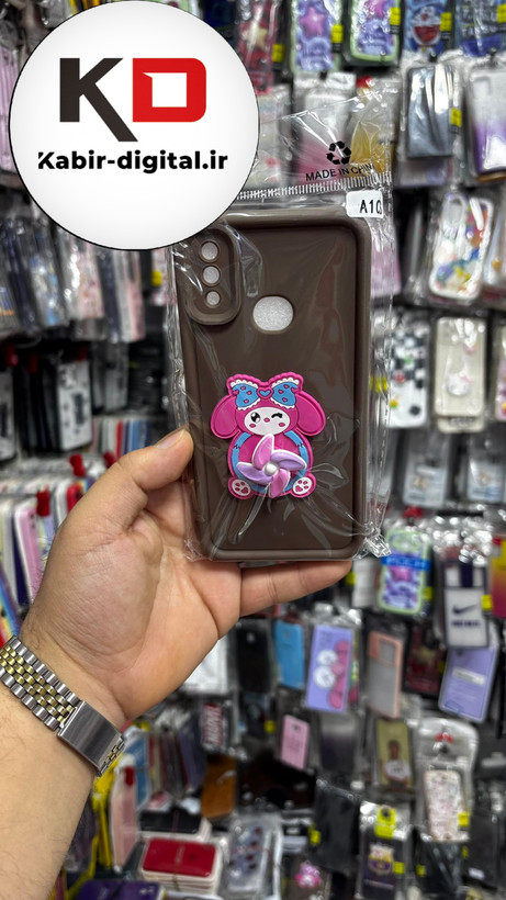 قاب گوشی Galaxy A10s سامسونگ سیلیکونی اسپینر دار (پاپ سوکت دار) طرح ملودی صورتی محافظ لنزدار
