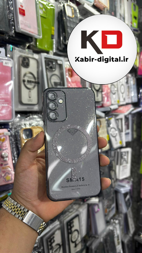 قاب گوشی Galaxy A15 سامسونگ الکتروپلیتینگ ژله ای شفاف اورجینال طرح مگ سیف نگین دار شاین محافظ لنز دار مشکی