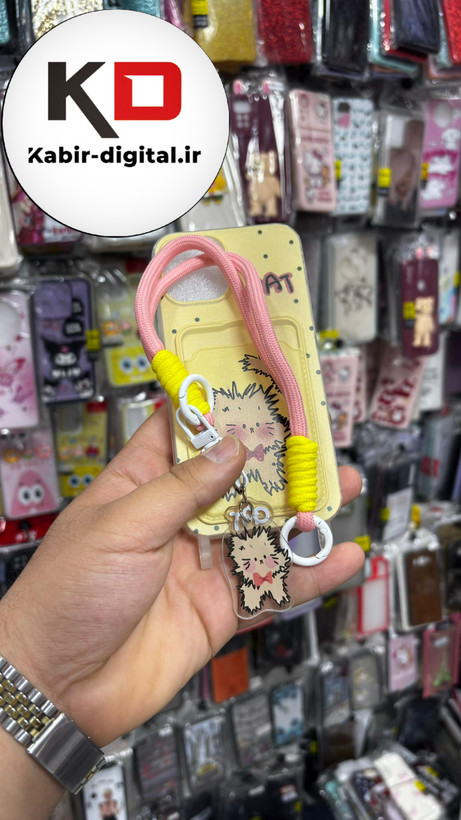 قاب گوشی iPhone 13 Pro آیفون اورجینال ژله ای جاکارتی دار کپسولی به همراه بند آویز دوطرفه طرح گربه کیوت