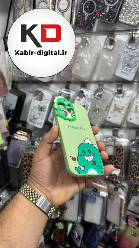 قاب گوشی iPhone 13/14/15 آیفون طرح سیلیکونی ژله ای سه بعدی برجسته عروسکی دایناسور محافظ لنز دار سبز
