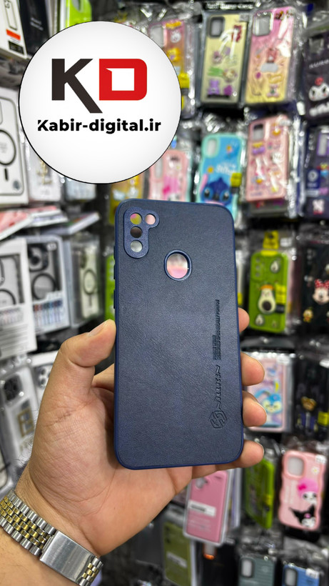 قاب گوشی Galaxy A11/M11 سامسونگ نیلکین NILLKIN سوزنی چرمی محافظ لنز دار سرمه ایی