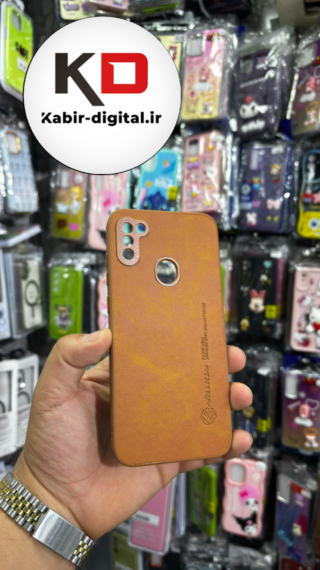 قاب گوشی Galaxy A11/M11 سامسونگ نیلکین NILLKIN سوزنی چرمی محافظ لنز دار عسلی