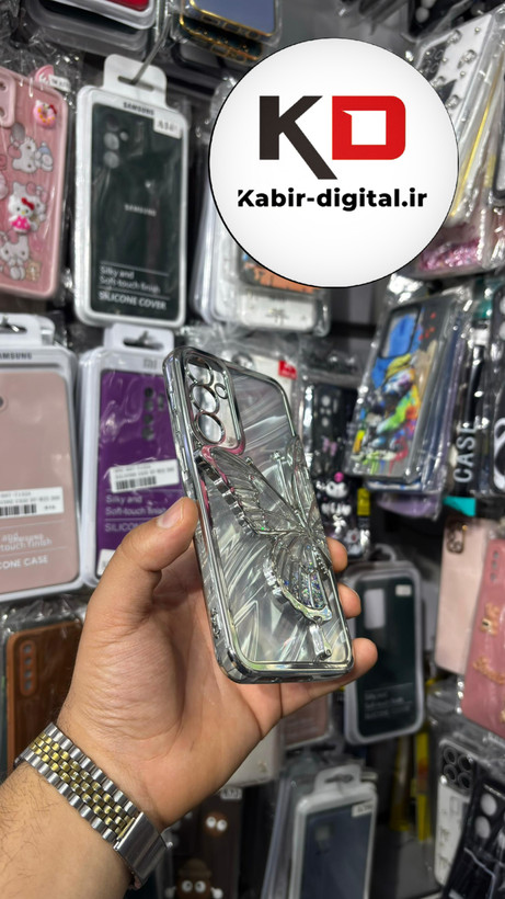 قاب گوشی Galaxy S23 FEسامسونگ آکواریومی طرح پروانه Butterfly برجسته اکلیلی نقره ایی محافظ لنز دار