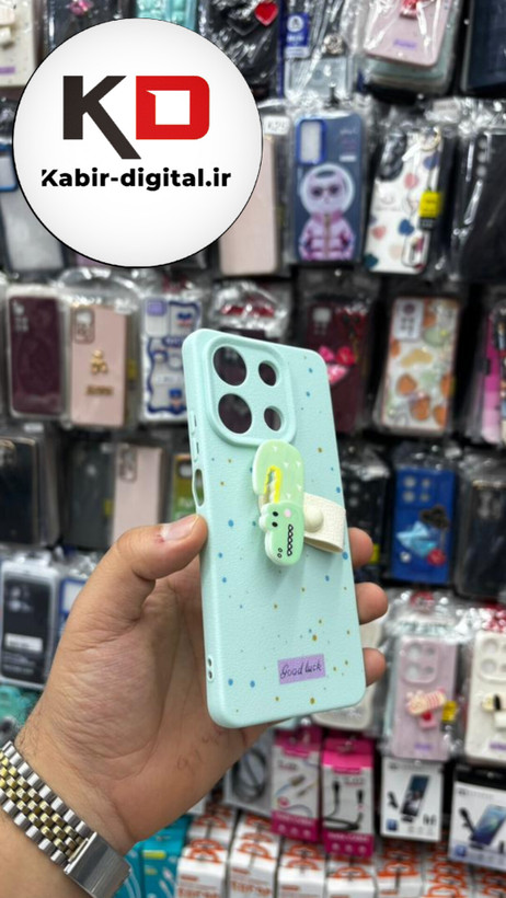قاب گوشی RedmiNote 13 4G شیائومی سیلیکونی فانتزی برجسته لاکچری هولدردار فانتزی طرح دایناسور سبزآبی