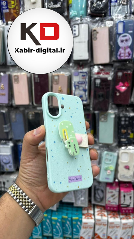 قاب گوشی iPhone 16 Pro Max آیفون سیلیکونی فانتزی برجسته لاکچری هولدردار فانتزی طرح دایناسور سبزآبی