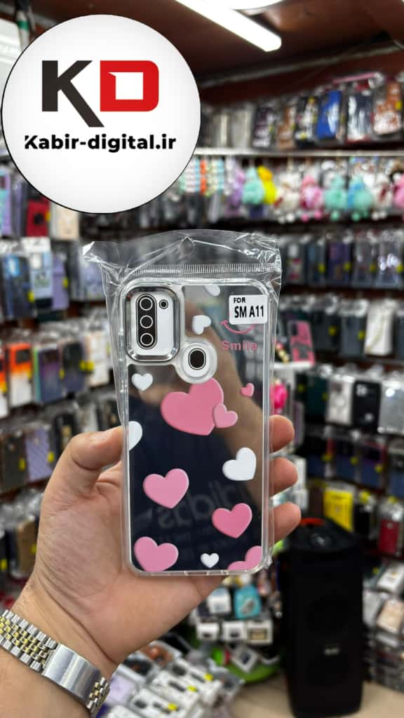 قاب گوشی Galaxy A11/M11 سامسونگ اورجینال فانتزی سخت آینه ای لنز کرومی ایربگ دار طرح قلب صورتی کیوت