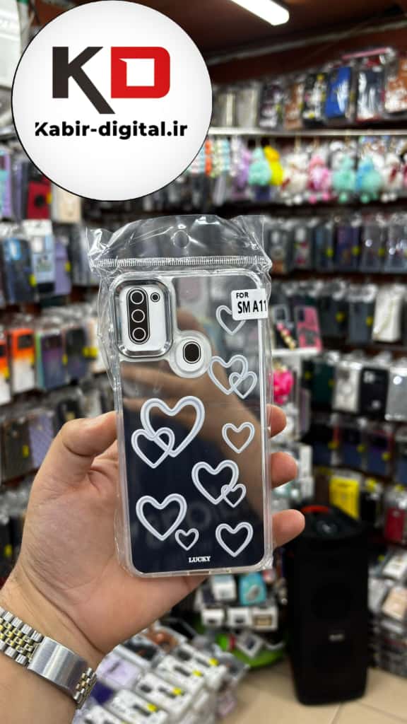 قاب گوشی Galaxy A11/M11 سامسونگ اورجینال فانتزی سخت آینه ای لنز کرومی ایربگ دار طرح قلب سفید کیوت