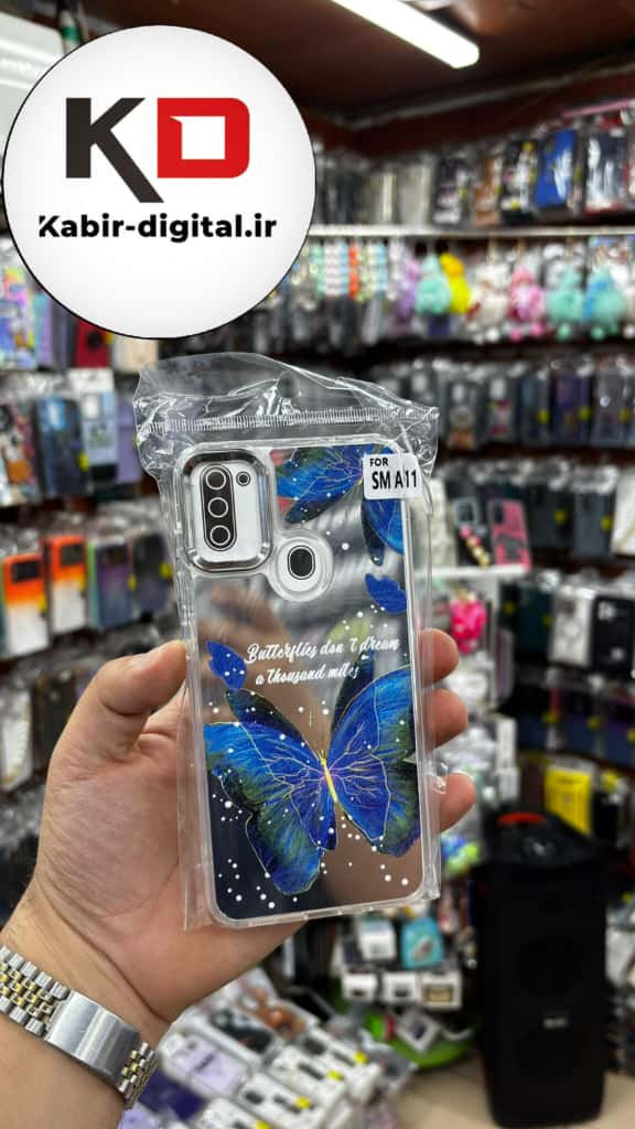 قاب گوشی Galaxy A11/M11 سامسونگ اورجینال فانتزی سخت آینه ای لنز کرومی ایربگ دار طرح پروانه آبی کیوت