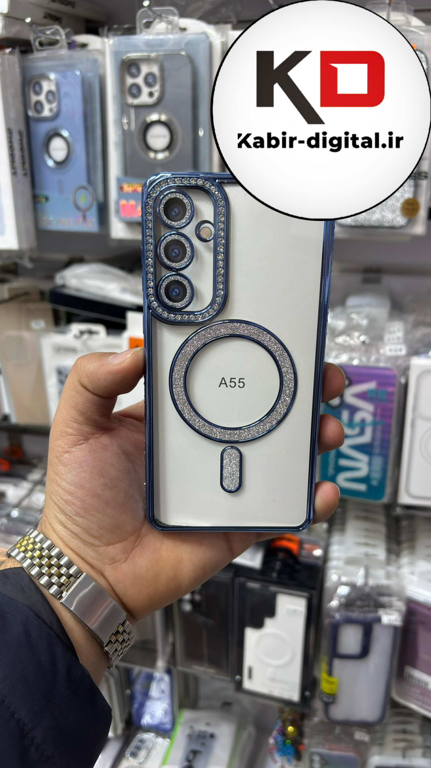 قاب گوشی Galaxy A55 سامسونگ الکتروپلیتینگ ژله ای شفاف اورجینال طرح مگ سیف نگین دار شاین محافظ لنز دار آبی