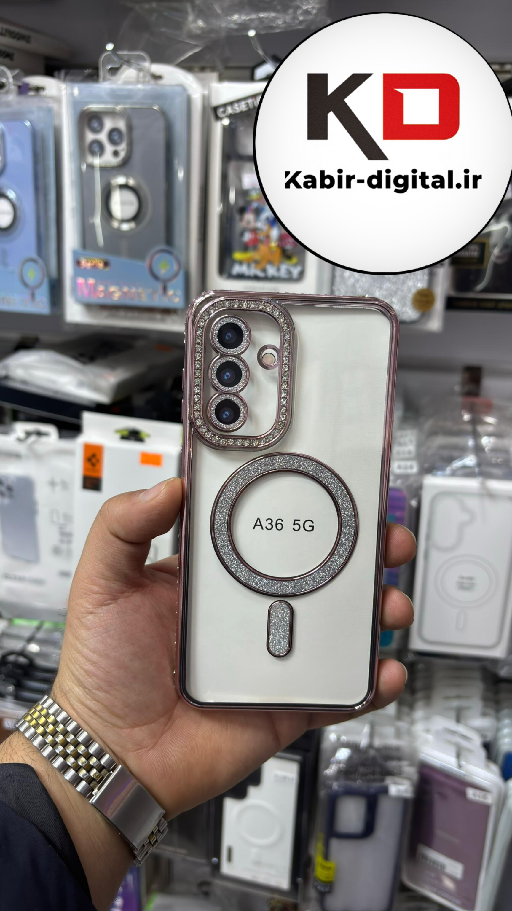 قاب گوشی Galaxy A36 سامسونگ الکتروپلیتینگ ژله ای شفاف اورجینال طرح مگ سیف نگین دار شاین محافظ لنز دار صورتی