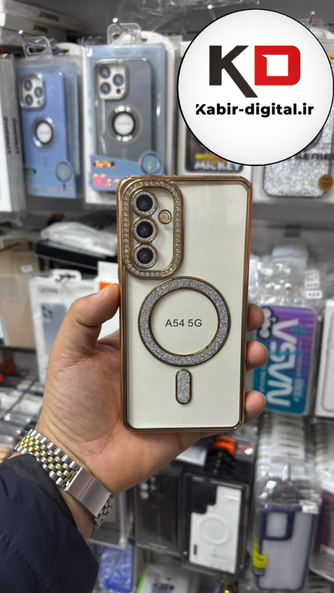 قاب گوشی Galaxy A54 سامسونگ الکتروپلیتینگ ژله ای شفاف اورجینال طرح مگ سیف نگین دار شاین محافظ لنز دار طلایی