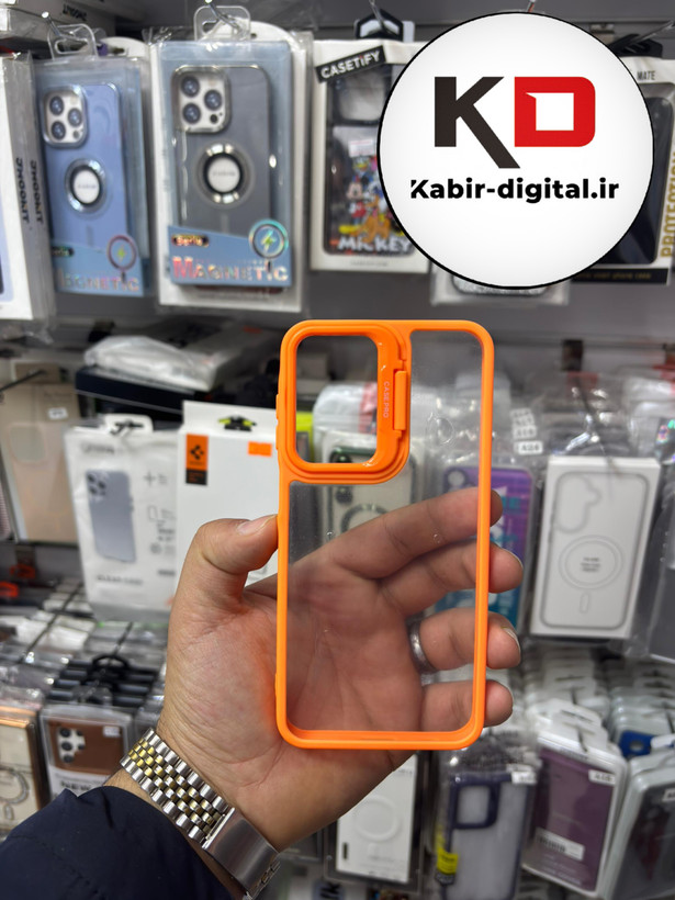قاب گوشی Galaxy S23 FEسامسونگ اورجینال متال کیس Metal اورجینال CASE PRO طرح پشت طلق شفاف دور سیلیکونی استندشو نارنجی