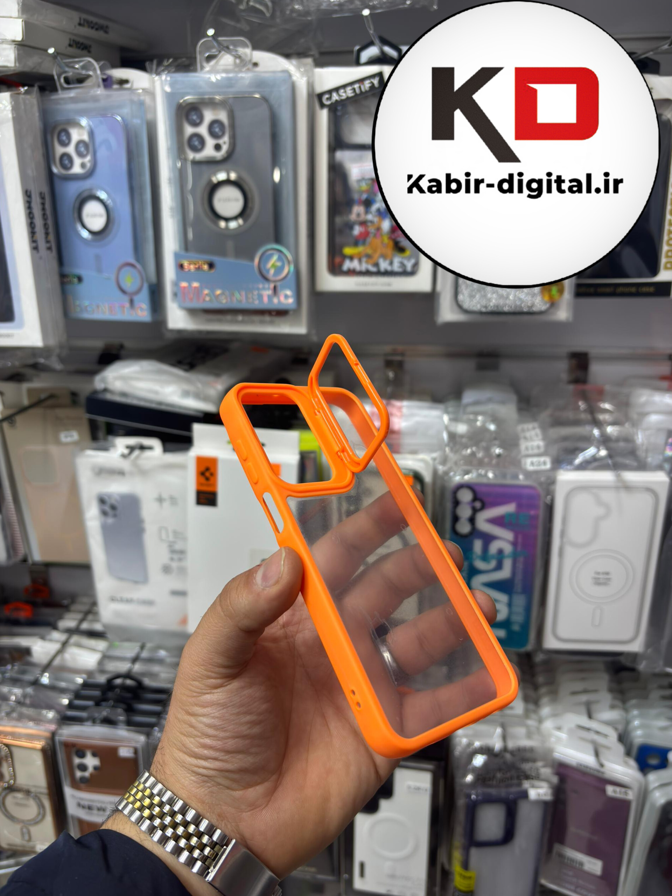 قاب گوشی Galaxy S23 FEسامسونگ اورجینال متال کیس Metal اورجینال CASE PRO طرح پشت طلق شفاف دور سیلیکونی استندشو نارنجی