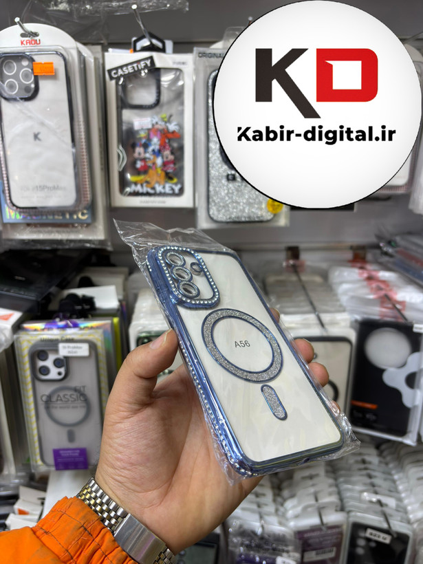 قاب گوشی Galaxy A56 سامسونگ الکتروپلیتینگ ژله ای شفاف اورجینال طرح مگ سیف محافظ لنز دار نگین دار آبی