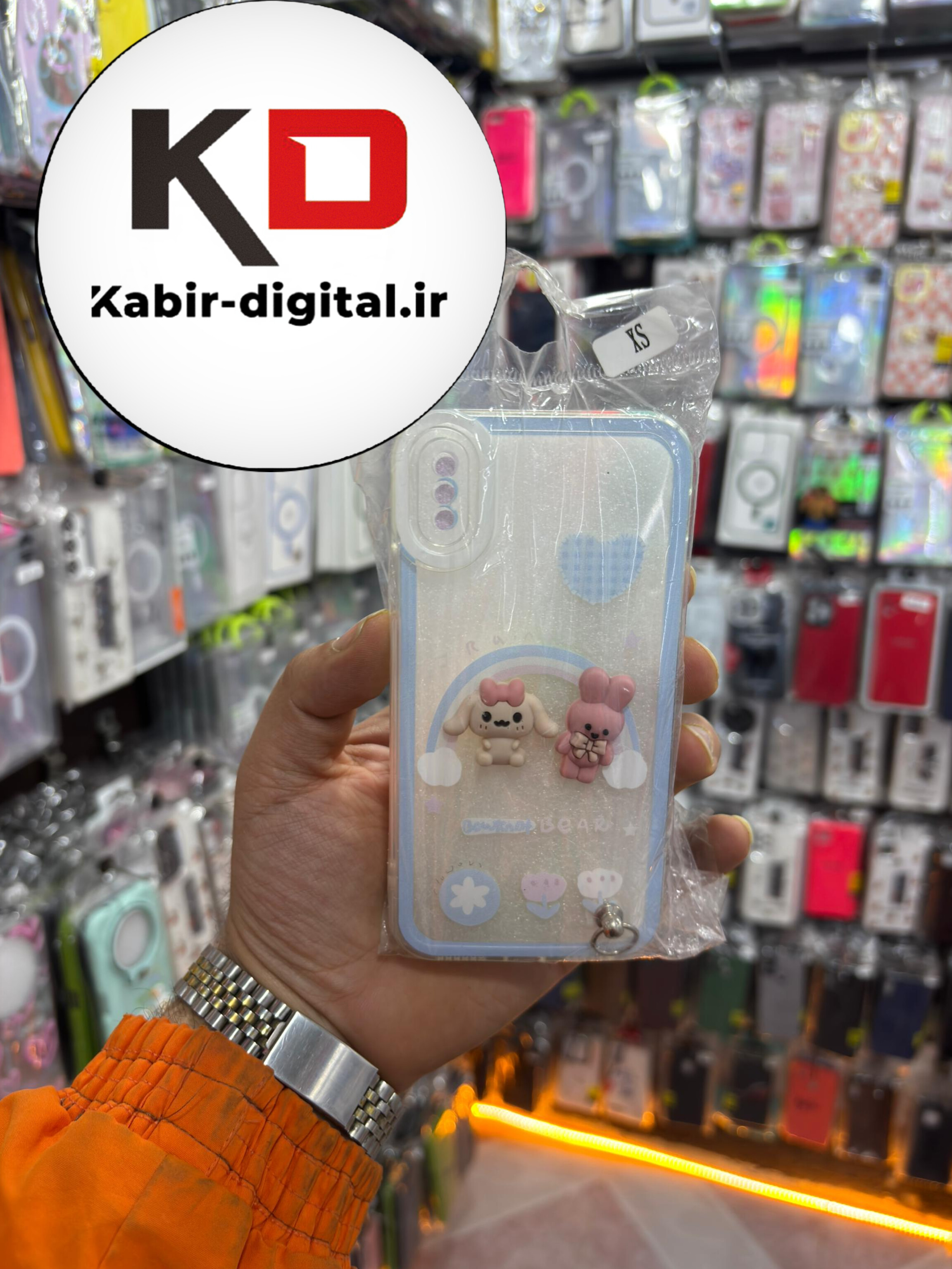قاب گوشی iPhone XS / X آیفون طرح عروسکی سه بعدی شفاف TPU کپسولی محافظ لنز دار سوییت خرگوشی آویزدار
