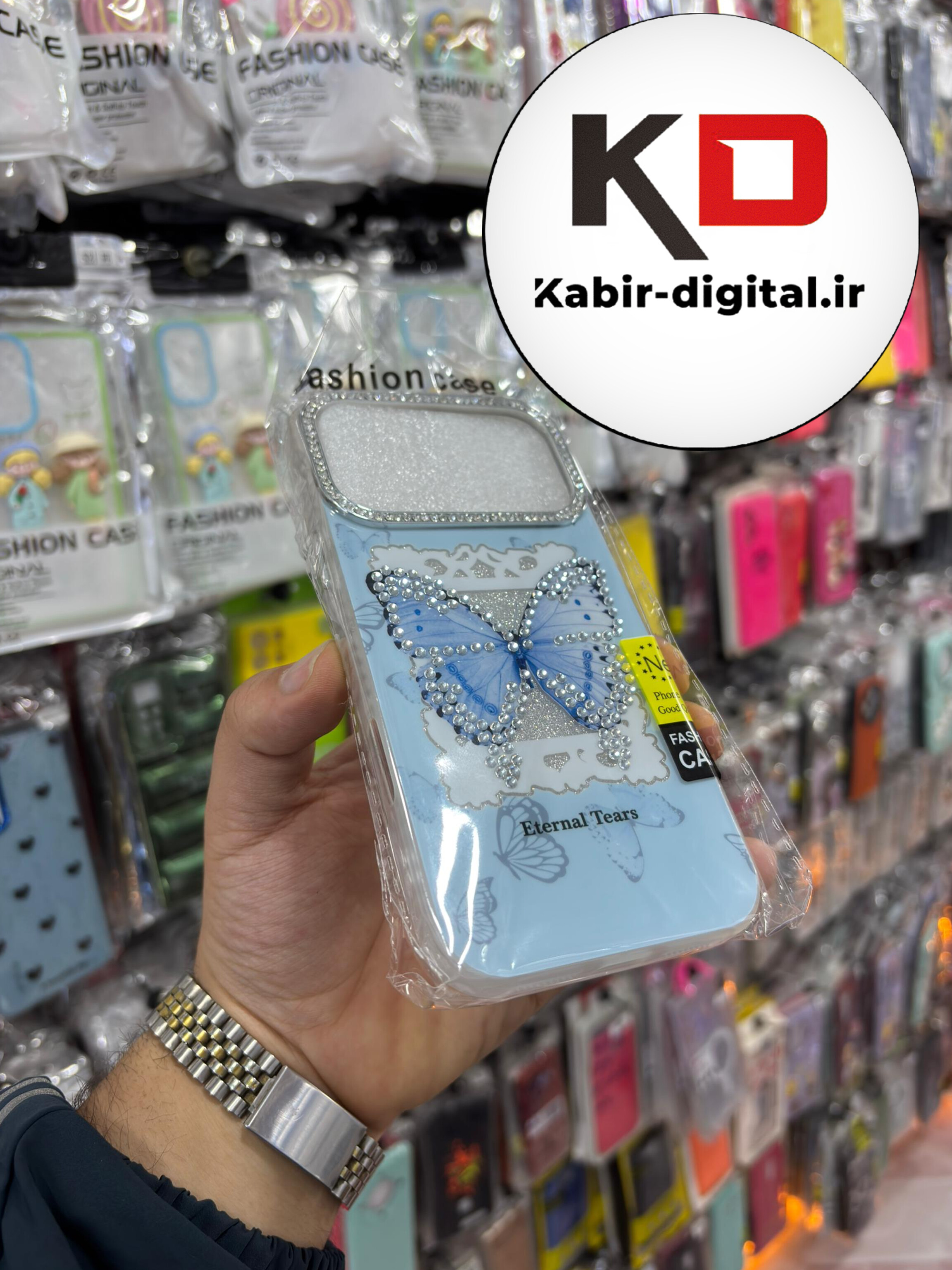 قاب گوشی iPhone 17 Pro Max آیفون فانتزی سخت Hard برجسته دکمه کرومی لنز نگین دار طرح پروانه کیوت