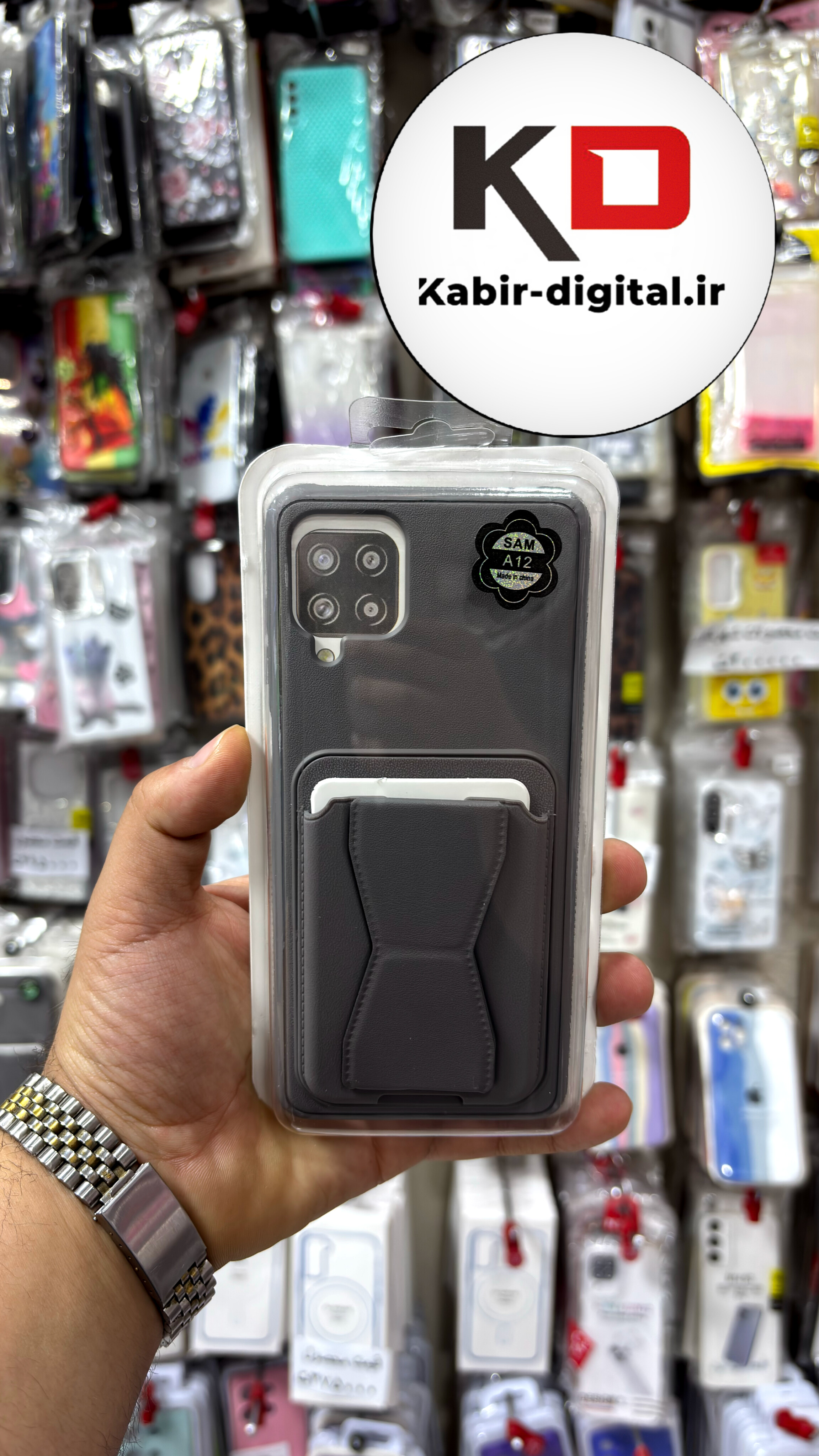 قاب گوشی Galaxy A12/M12 سامسونگ چرمی دوخت دار اورجینال جاکارتی دار مگنتی استندشو طوسی تیره