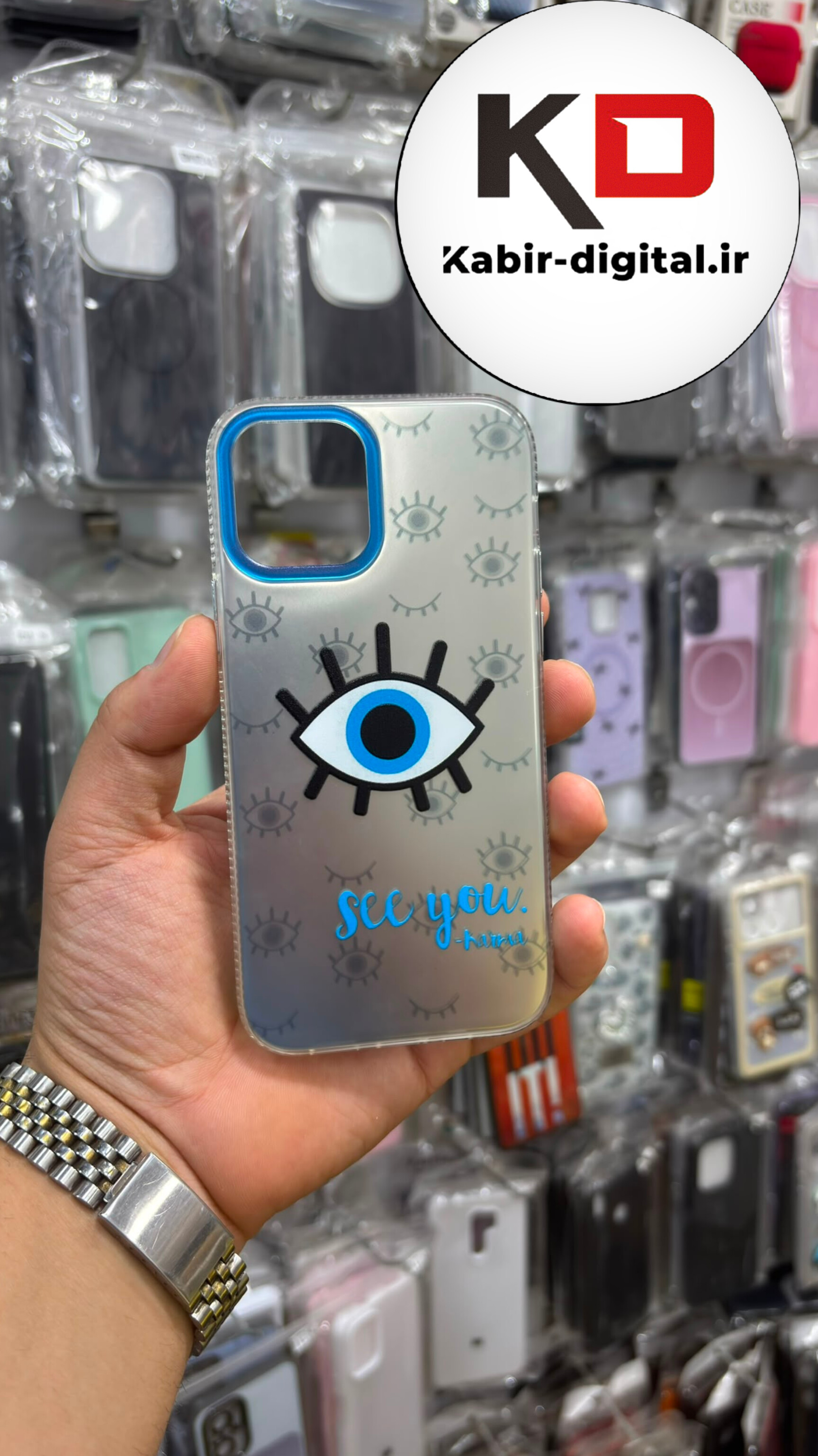 قاب گوشی iPhone 12 Pro / 12  آیفون So Cool طرح چشم چاپی برجسته نقره ای آبی دور نگین دار