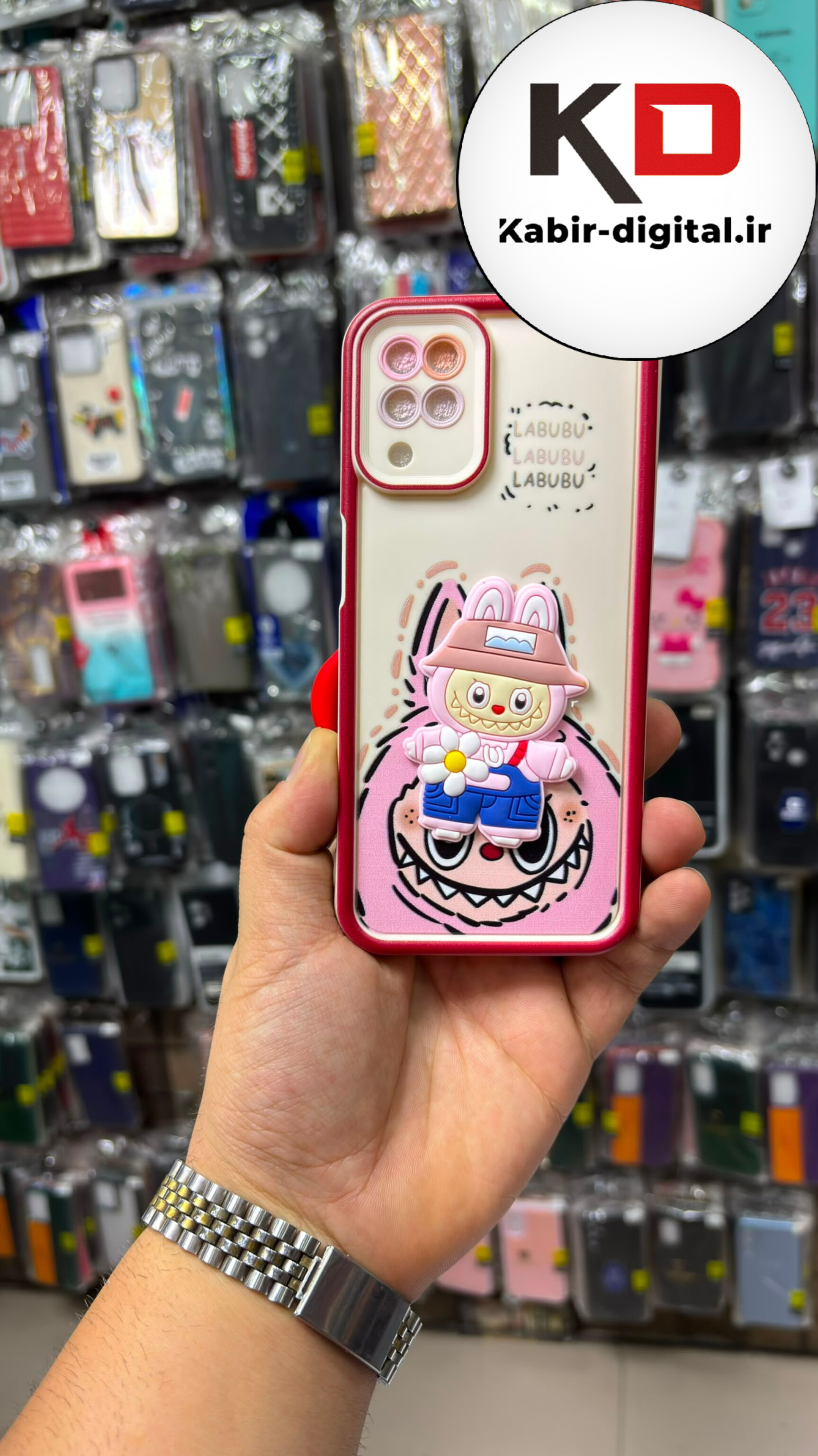 قاب گوشی Galaxy A12 / M12 سامسونگ سیلیکونی Solid Case عروسکی برجسته طرح لبوبو لنز رنگی دستبند دار مچی محافظ لنزدار