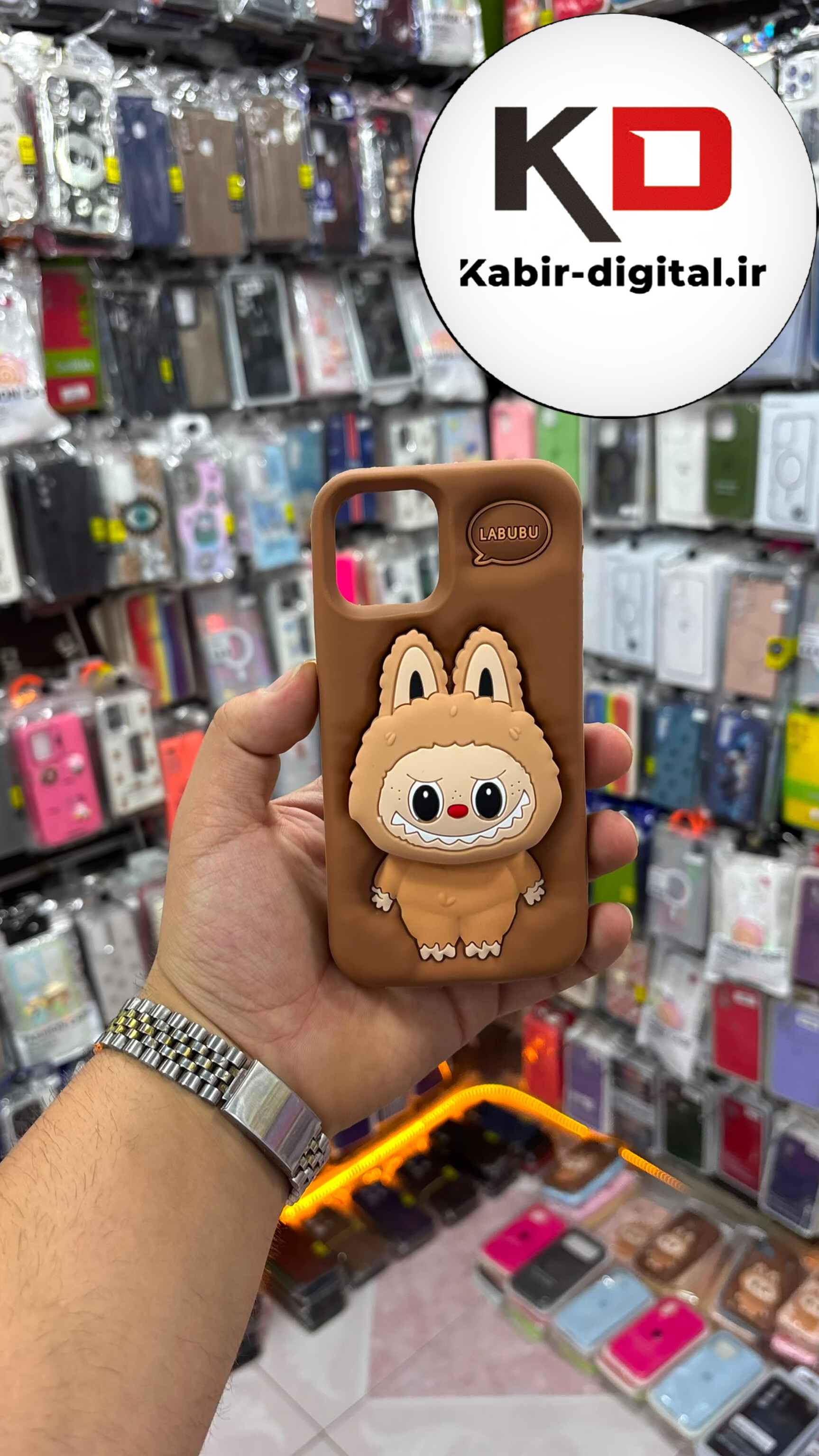 قاب گوشی iPhone 12 / 12 Pro آیفون سیلیکونی پاک کنی اورجینال عروسکی لبوبو موکا هولدری استند شو