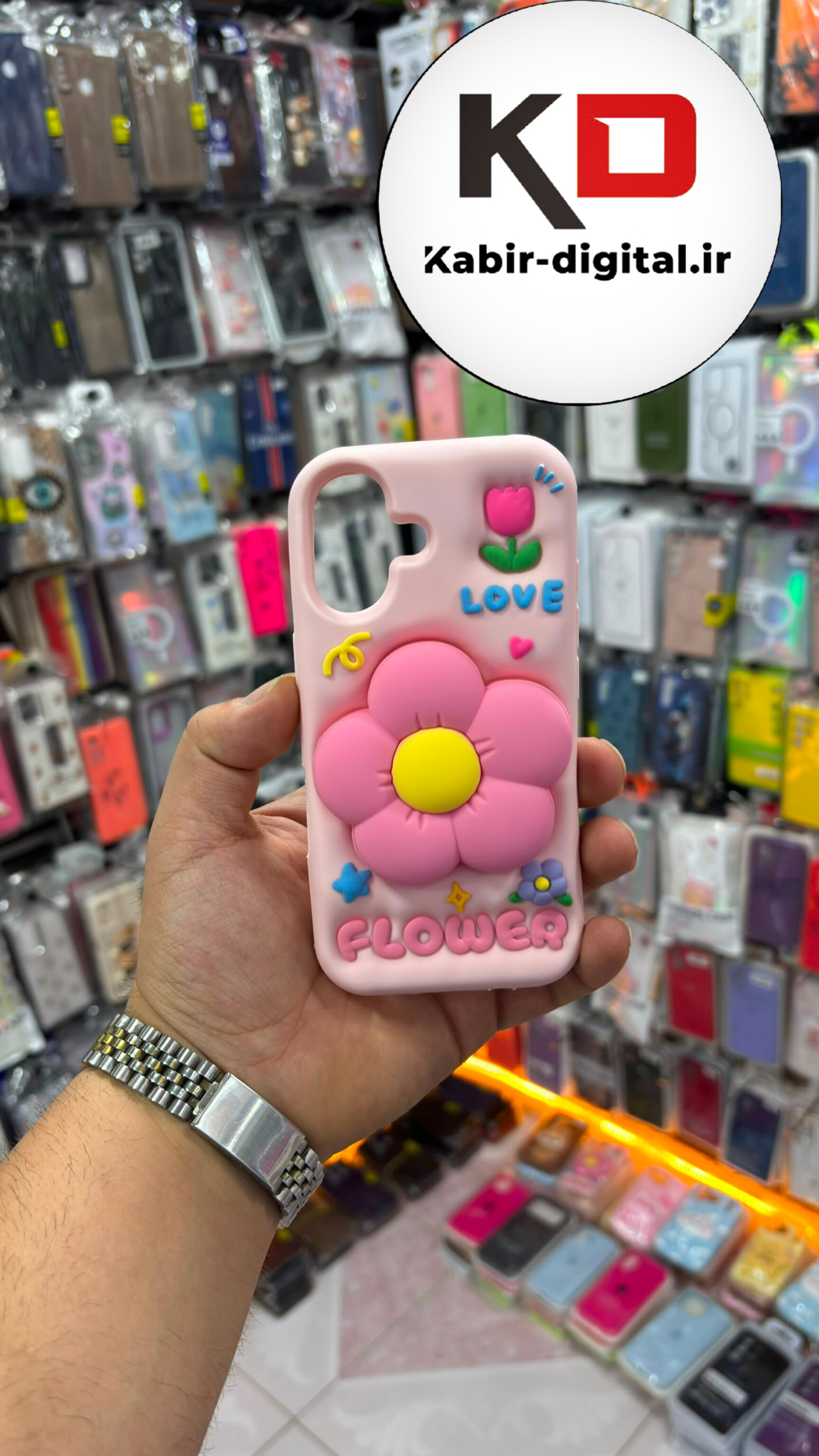 قاب گوشی iPhone 16 / 17 آیفون سیلیکونی پاک کنی اورجینال عروسکی گل صورتی هولدری استند شو
