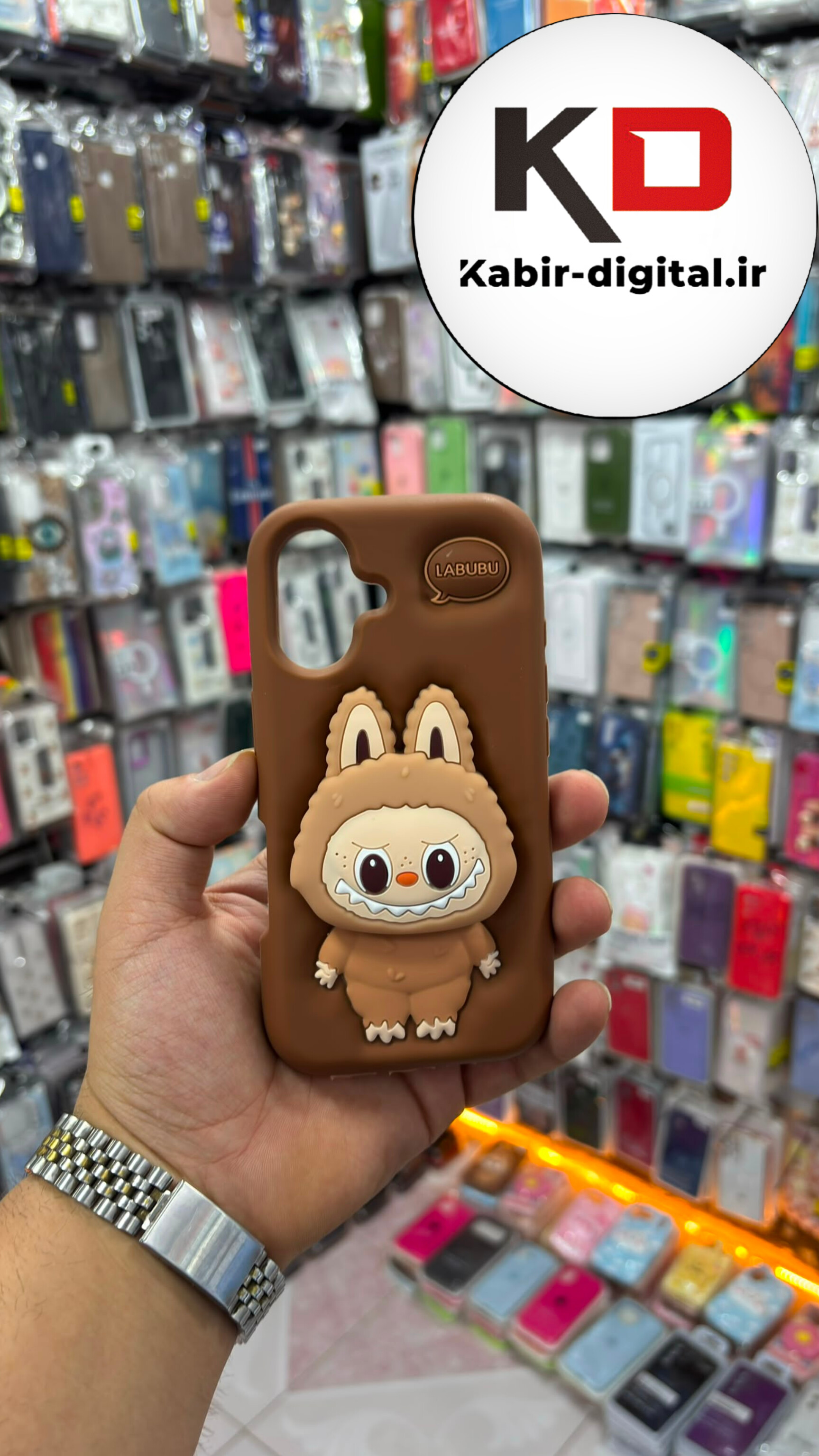 قاب گوشی iPhone 16 / 17 آیفون سیلیکونی پاک کنی اورجینال عروسکی لبوبو موکا هولدری استند شو