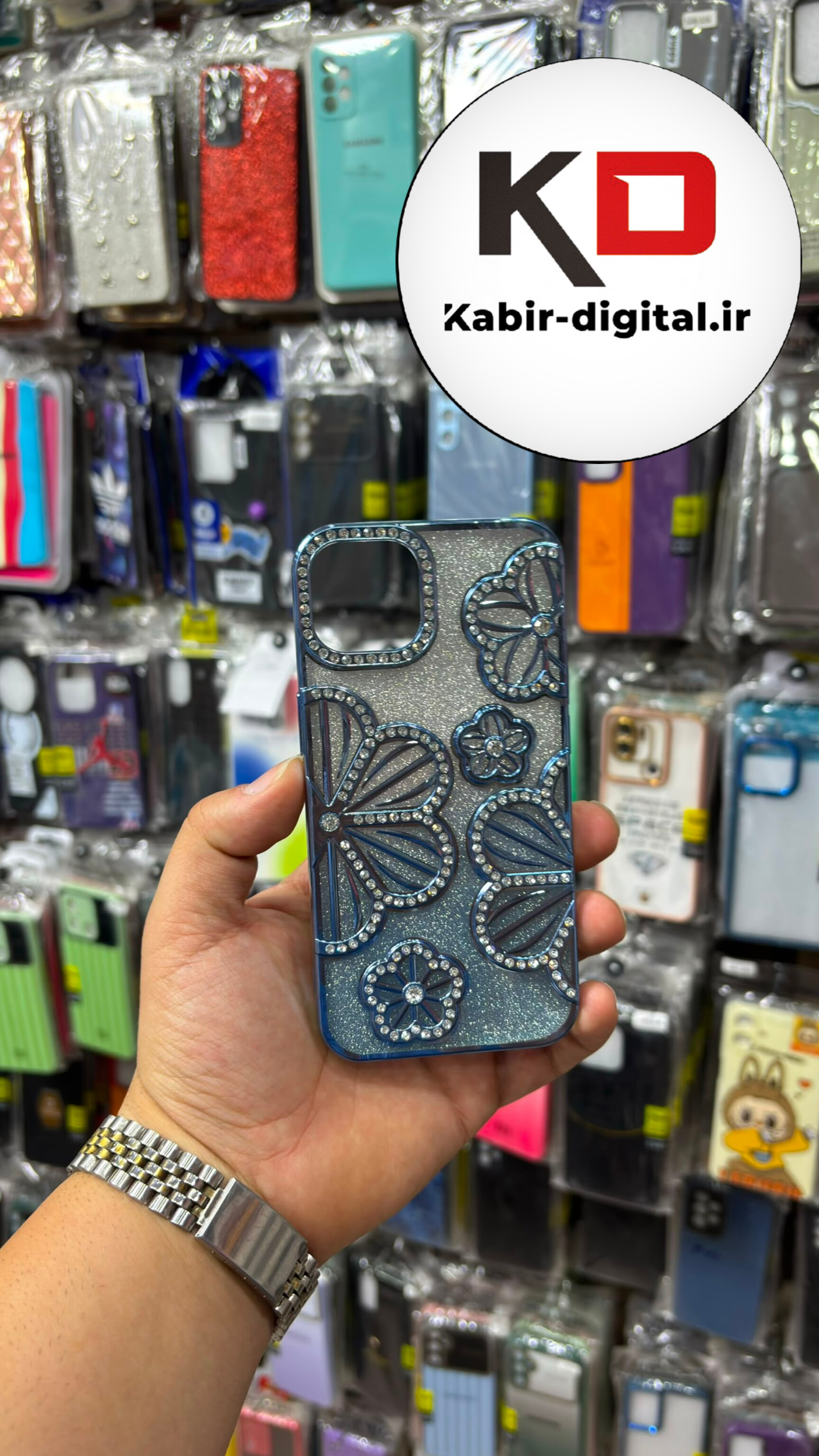 قاب گوشی iPhone 1۳ / 14 آیفون Flower Case گل رز نگین دار برجسته لنز الماسی شفاف اکلیلی آبی