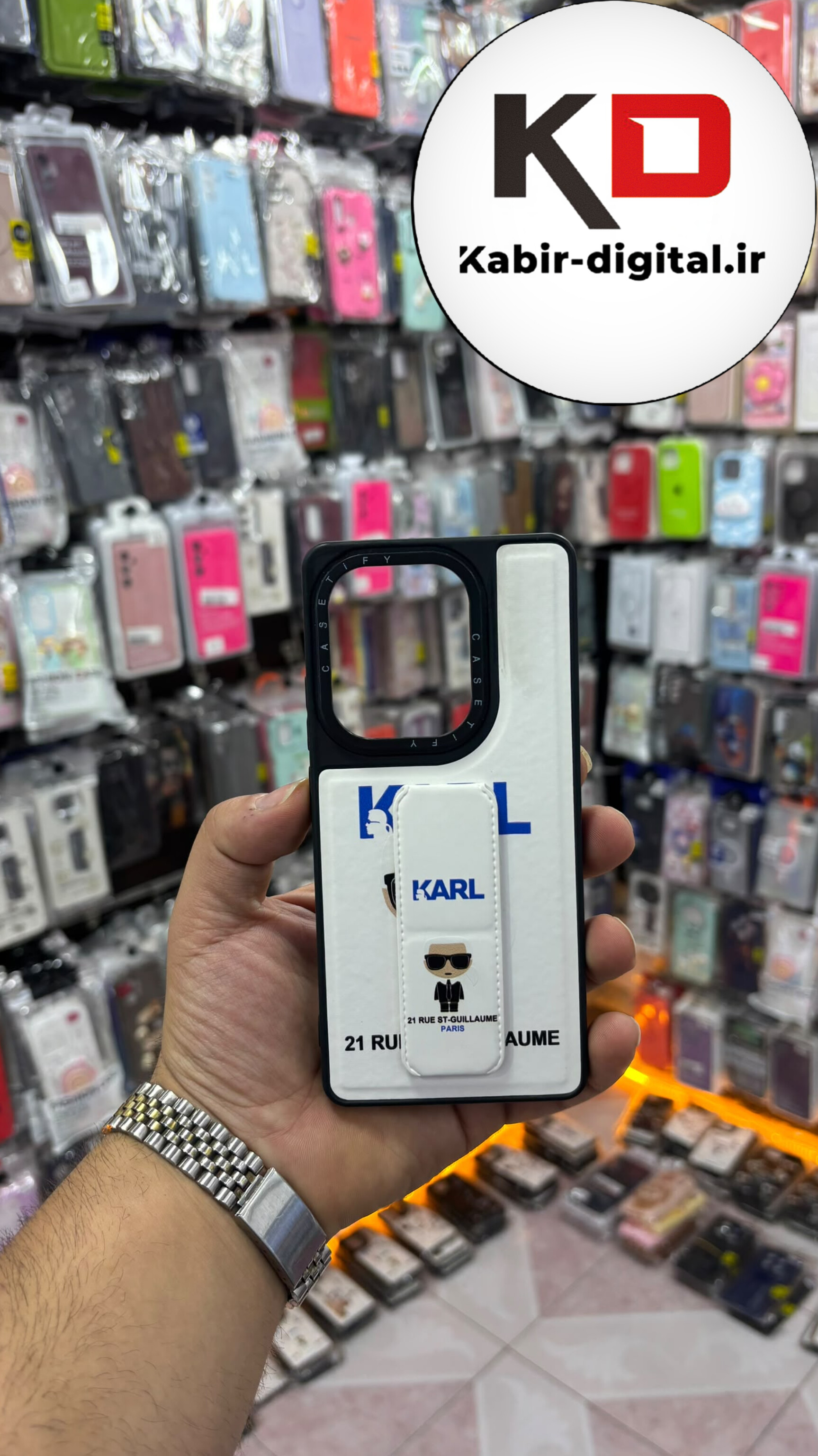 قاب گوشی Redmi Note 14S / Redmi Note 13 Pro 4G / Poco M6 Pro 4G شیائومی Casetify استند شو اسپرت لنز برجسته طرح کارل سفید