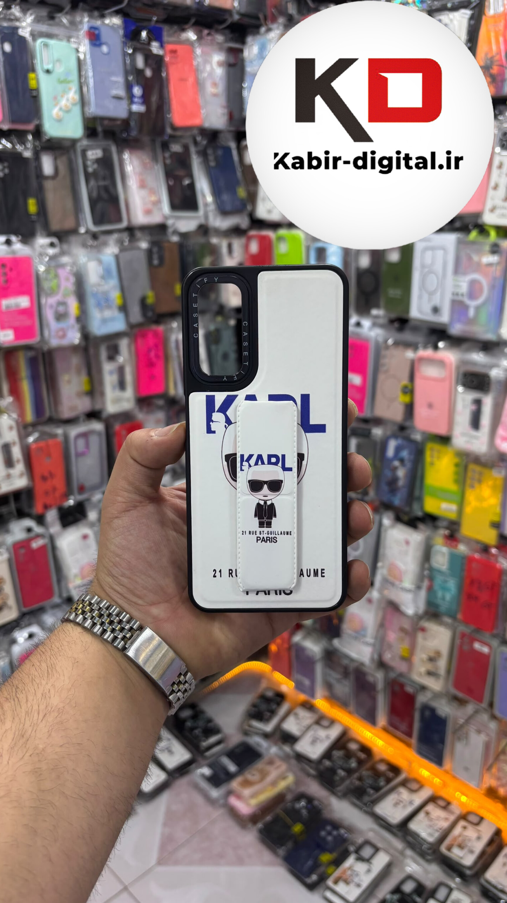 قاب گوشی Galaxy A05S سامسونگ Casetify استند شو اسپرت لنز برجسته طرح کارل سفید
