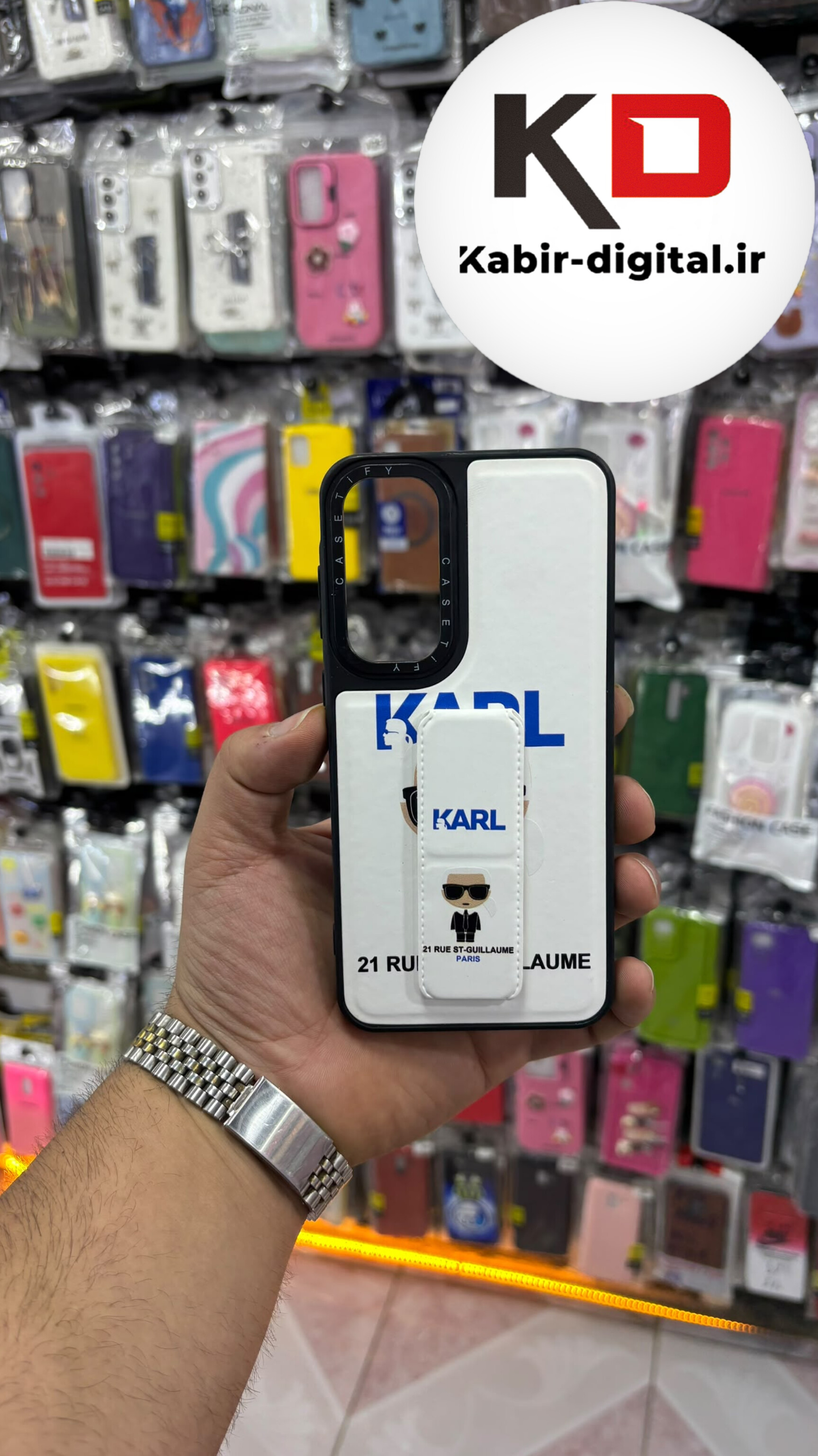 قاب گوشی Galaxy A54 سامسونگ Casetify استند شو اسپرت لنز برجسته طرح کارل سفید